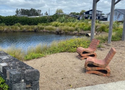 The use of local artist Peter Lange to create suitable unmovable furniture for general use in the reserves add to the character. 5